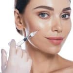 Beautician,Doing,Injections,Dermal,Fillers,Into,Female,Cheeks,For,A