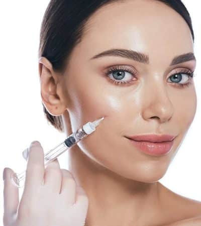 Beautician,Doing,Injections,Dermal,Fillers,Into,Female,Cheeks,For,A